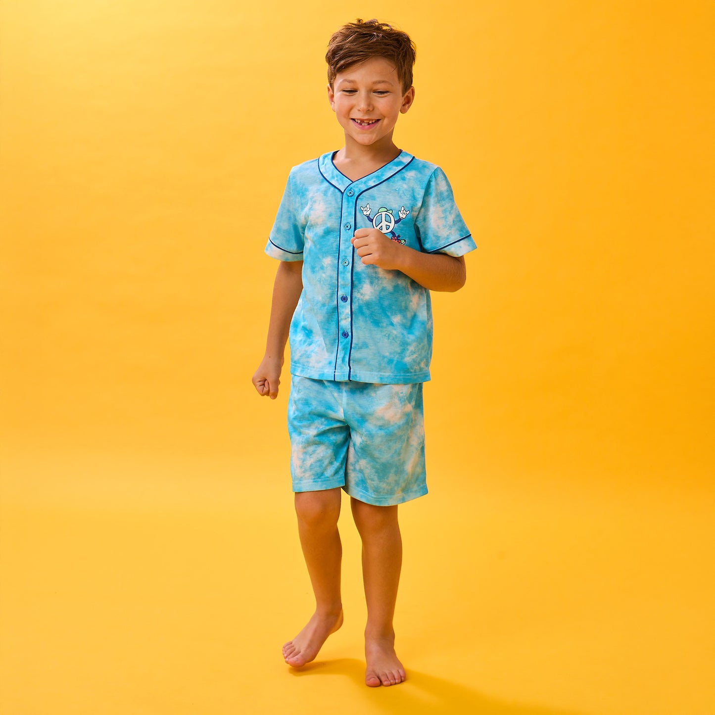Tie Dye Skater; @A boy wearing Sport Jersey Short Pj Set with Tie Dye Skater print