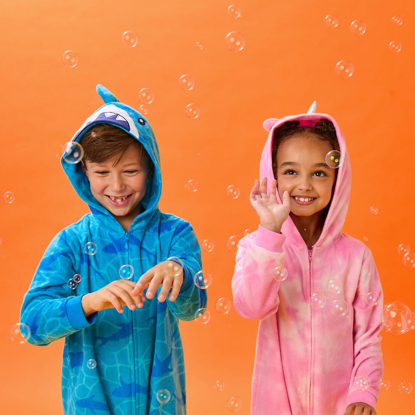 Unicorn;@A boy and a girl wearing Fleece Hooded Animal Onesie