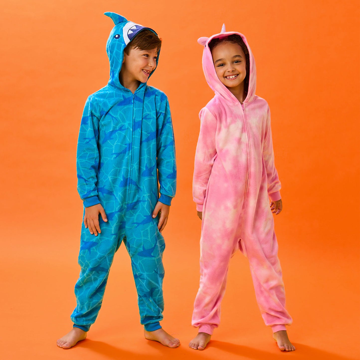 Unicorn;@A boy and a girl wearing Fleece Hooded Animal Onesie
