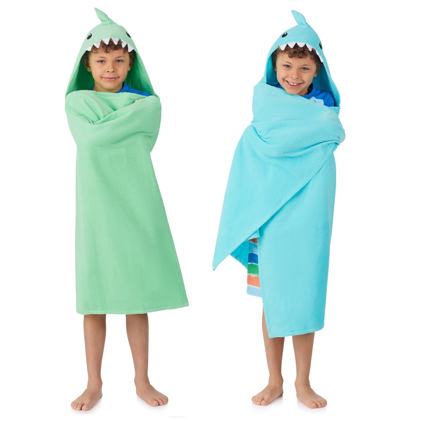 Fin-tastic Aqua & Seaweed Green;@A boy wearing 2 Pack Hooded Shark Towels in Fin-tastic Aqua & Seaweed Green