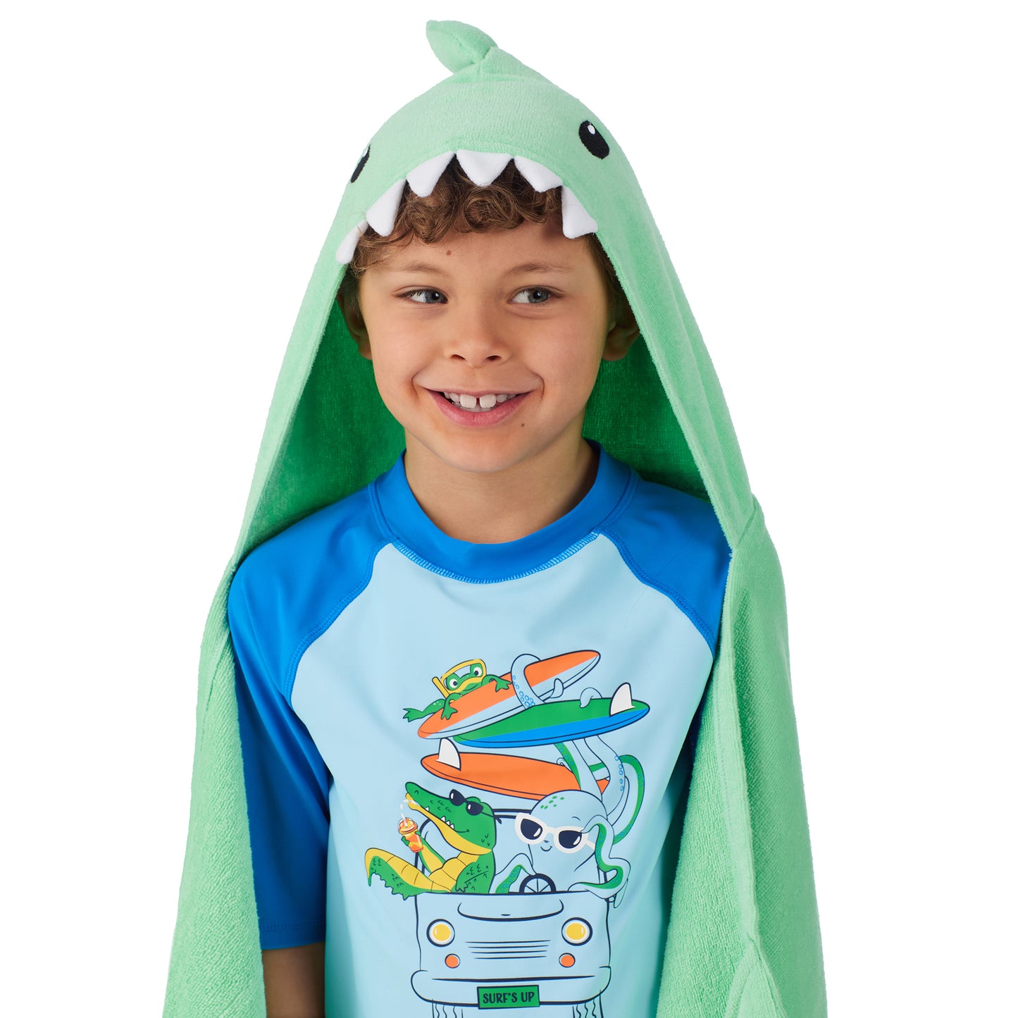 Fin-tastic Aqua & Seaweed Green;@A boy wearing 2 Pack Hooded Shark Towels in Fin-tastic Aqua & Seaweed Green