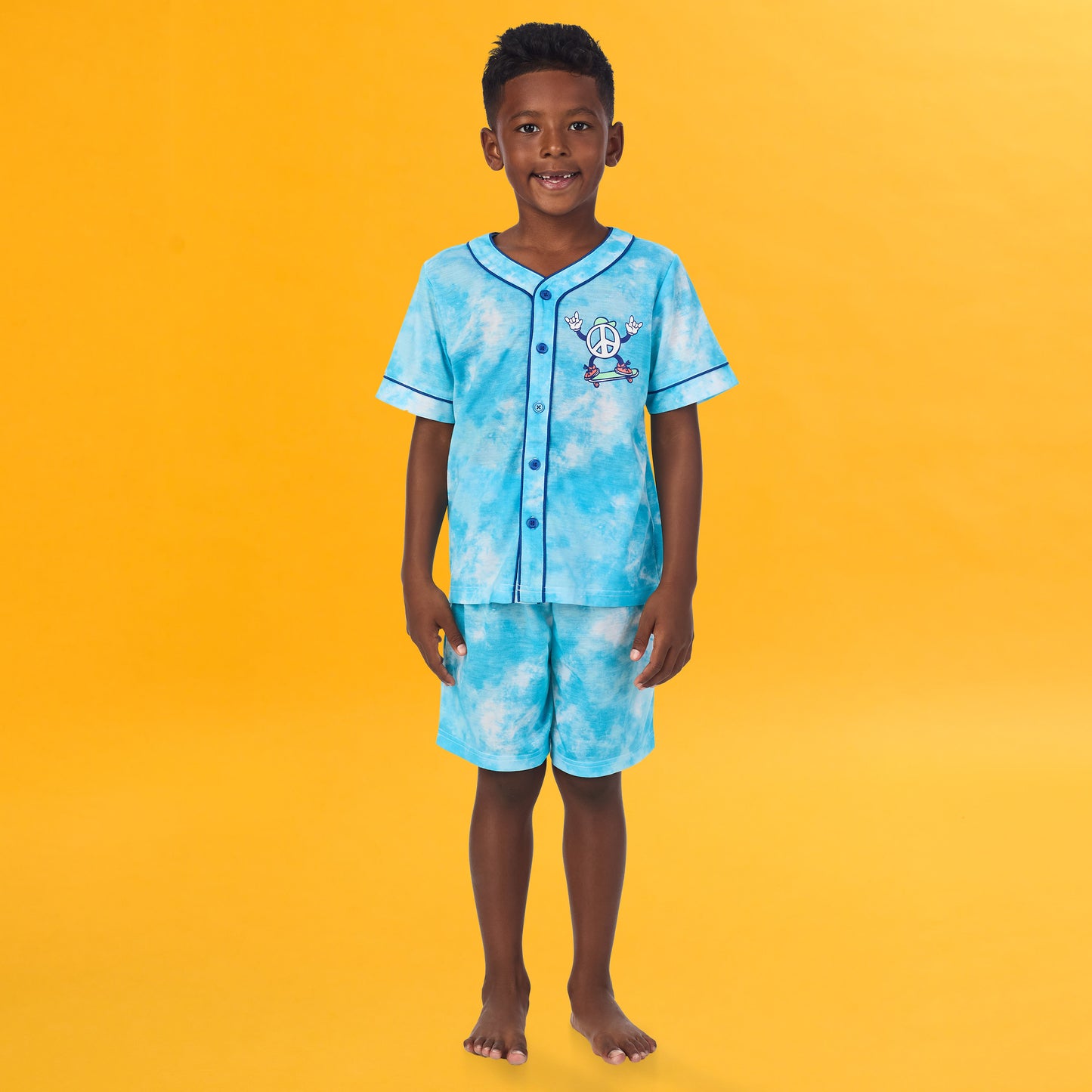 Tie Dye Skater; @A boy wearing Sport Jersey Short Pj Set with Tie Dye Skater print