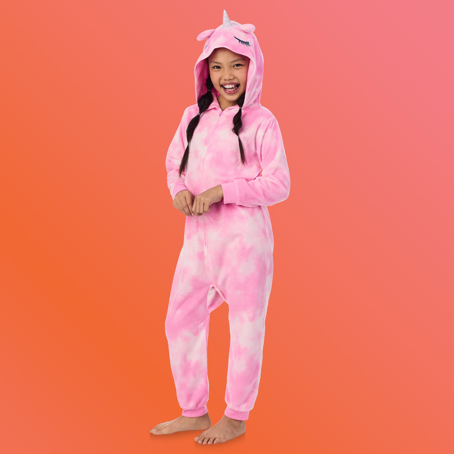 Unicorn;@A girl wearing Fleece Hooded Animal Onesie