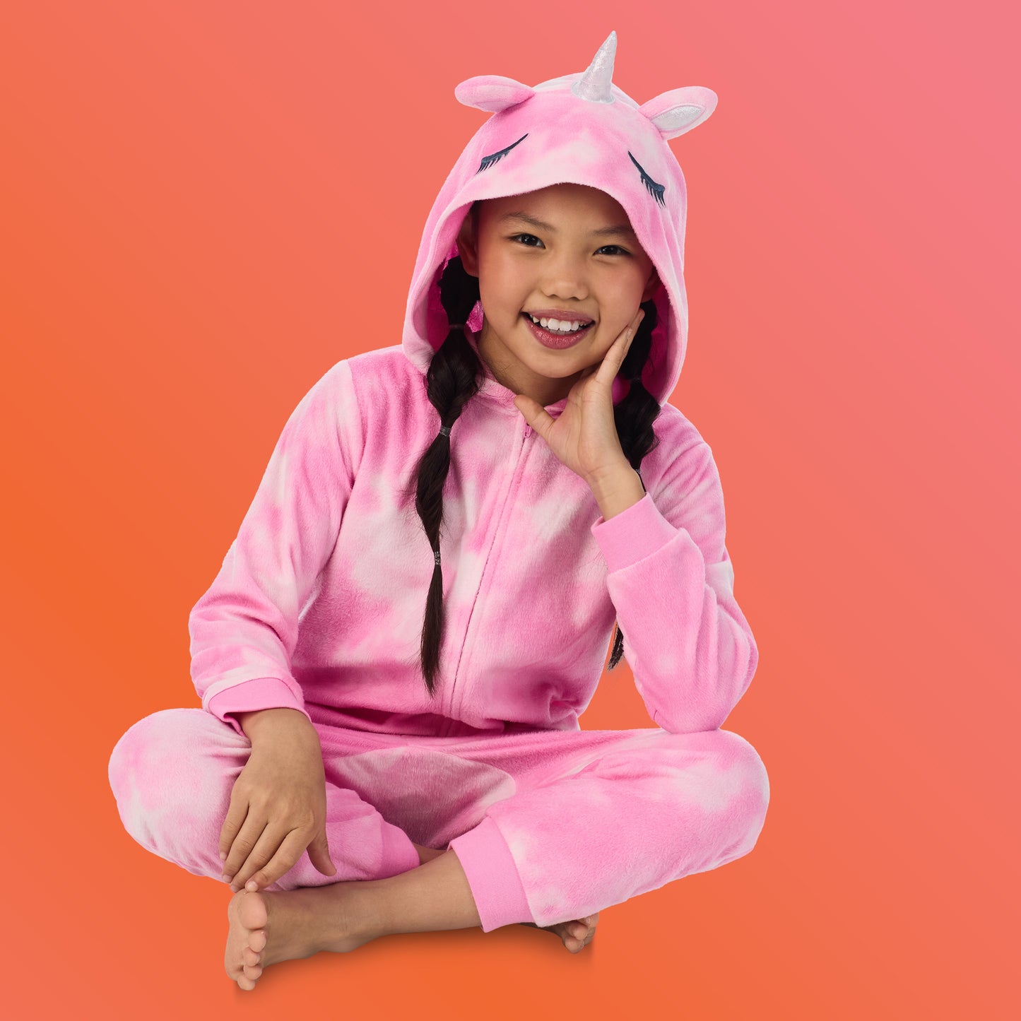Unicorn;@A girl wearing Fleece Hooded Animal Onesie