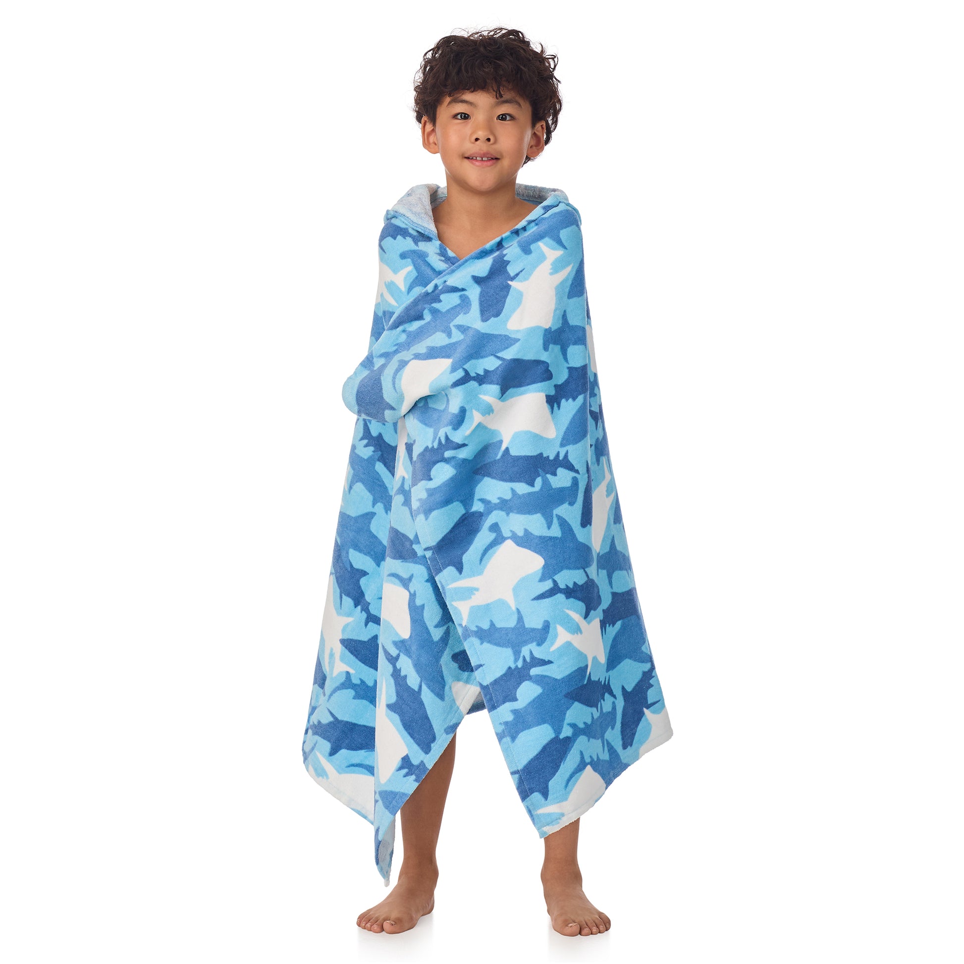 Fin Frenzy Blue;@A boy wearing Character Hooded Towels in Fin Frenzy Blue
