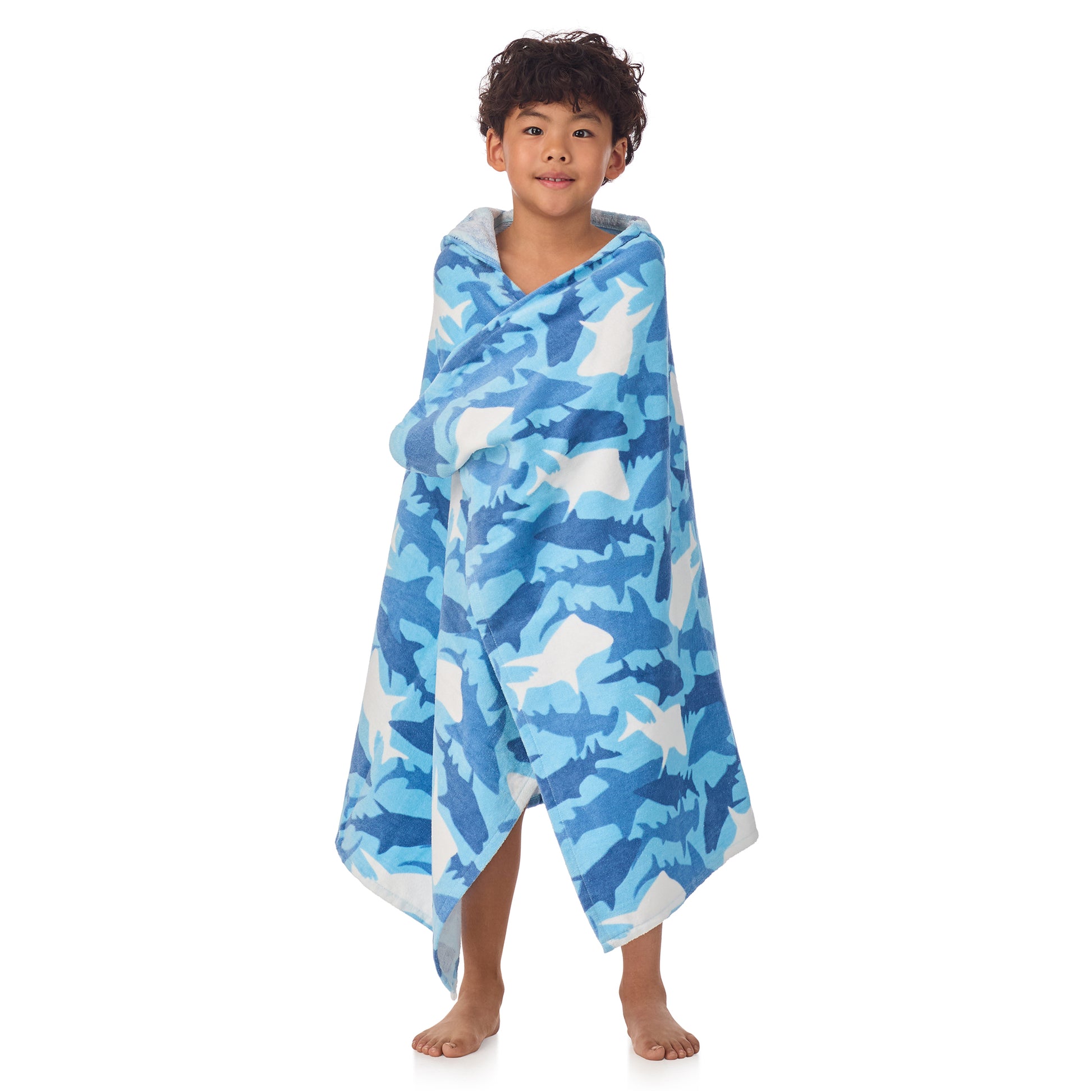 Fin Frenzy Blue;@A boy wearing Character Hooded Towels in Fin Frenzy Blue
