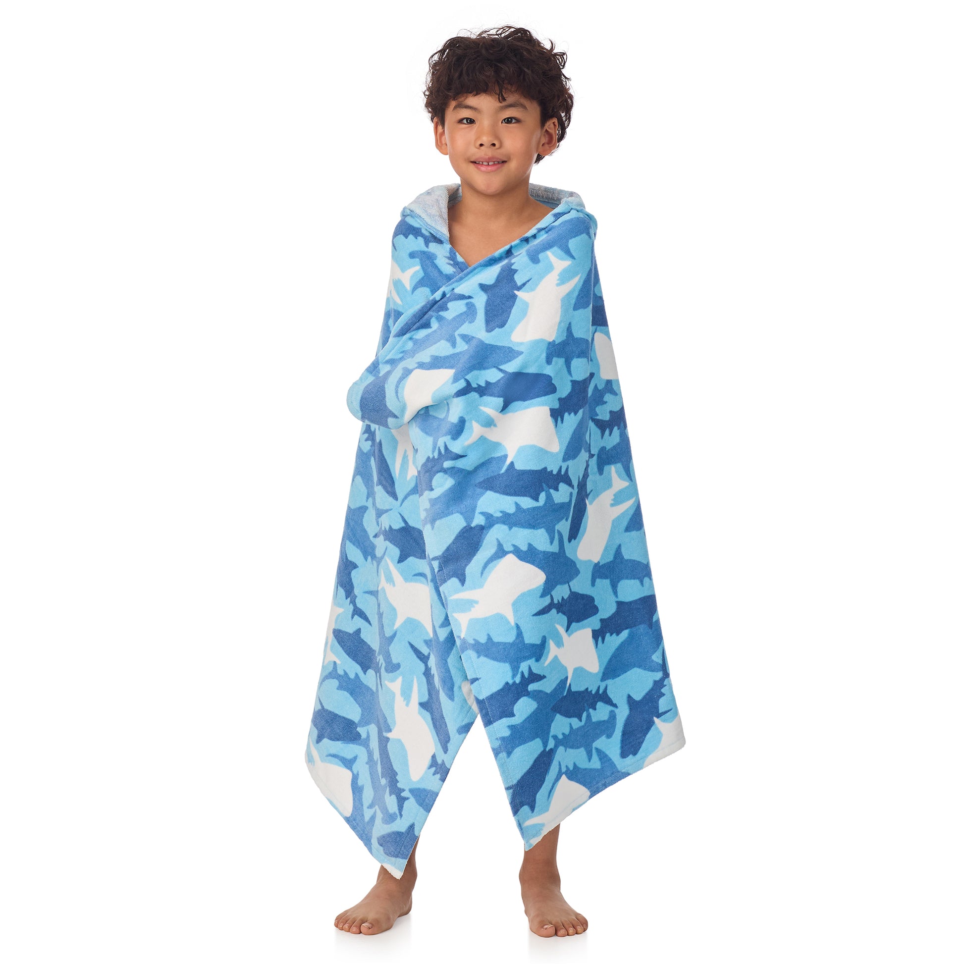 Fin Frenzy Blue;@A boy wearing Character Hooded Towels in Fin Frenzy Blue
