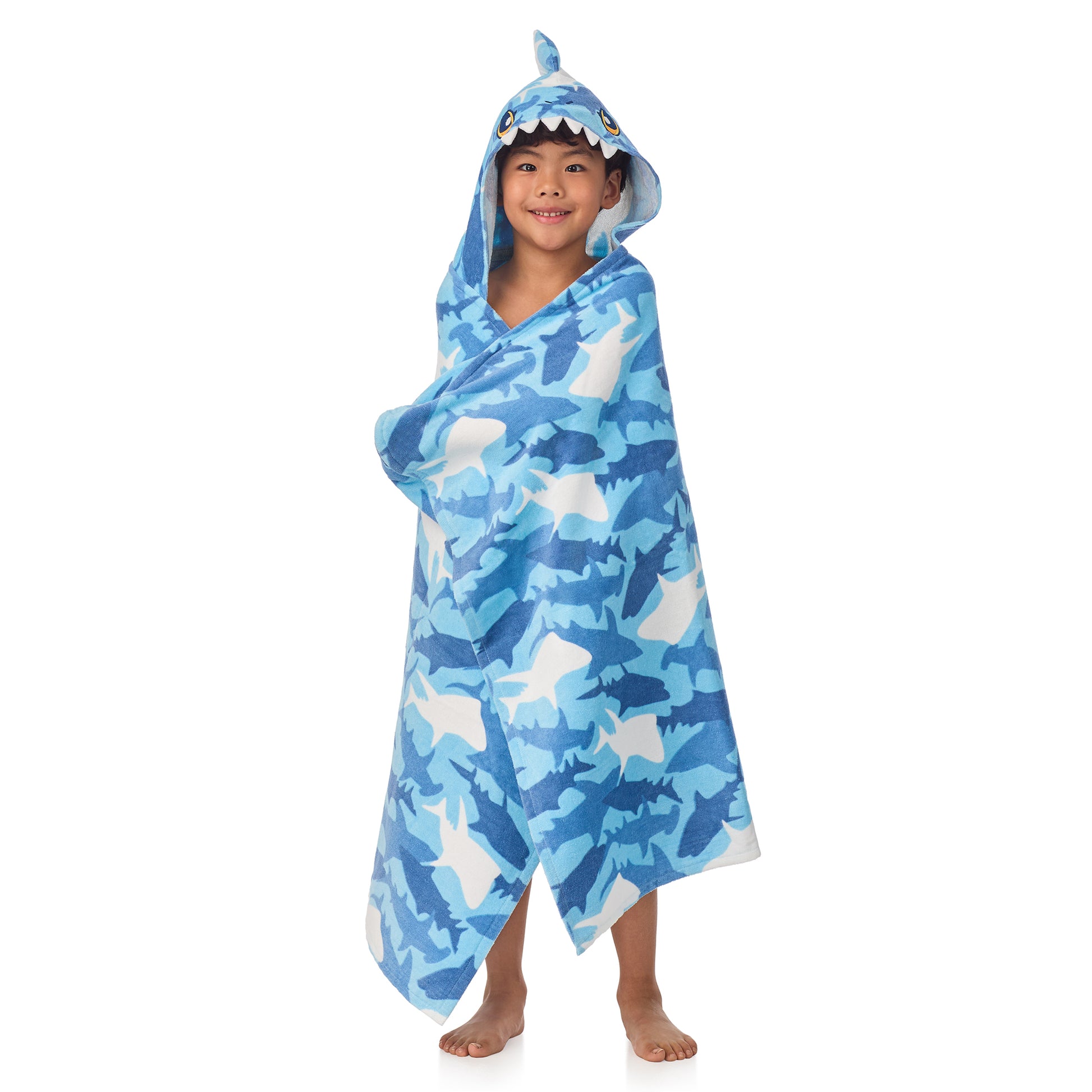 Fin Frenzy Blue;@A boy wearing Character Hooded Towels in Fin Frenzy Blue
