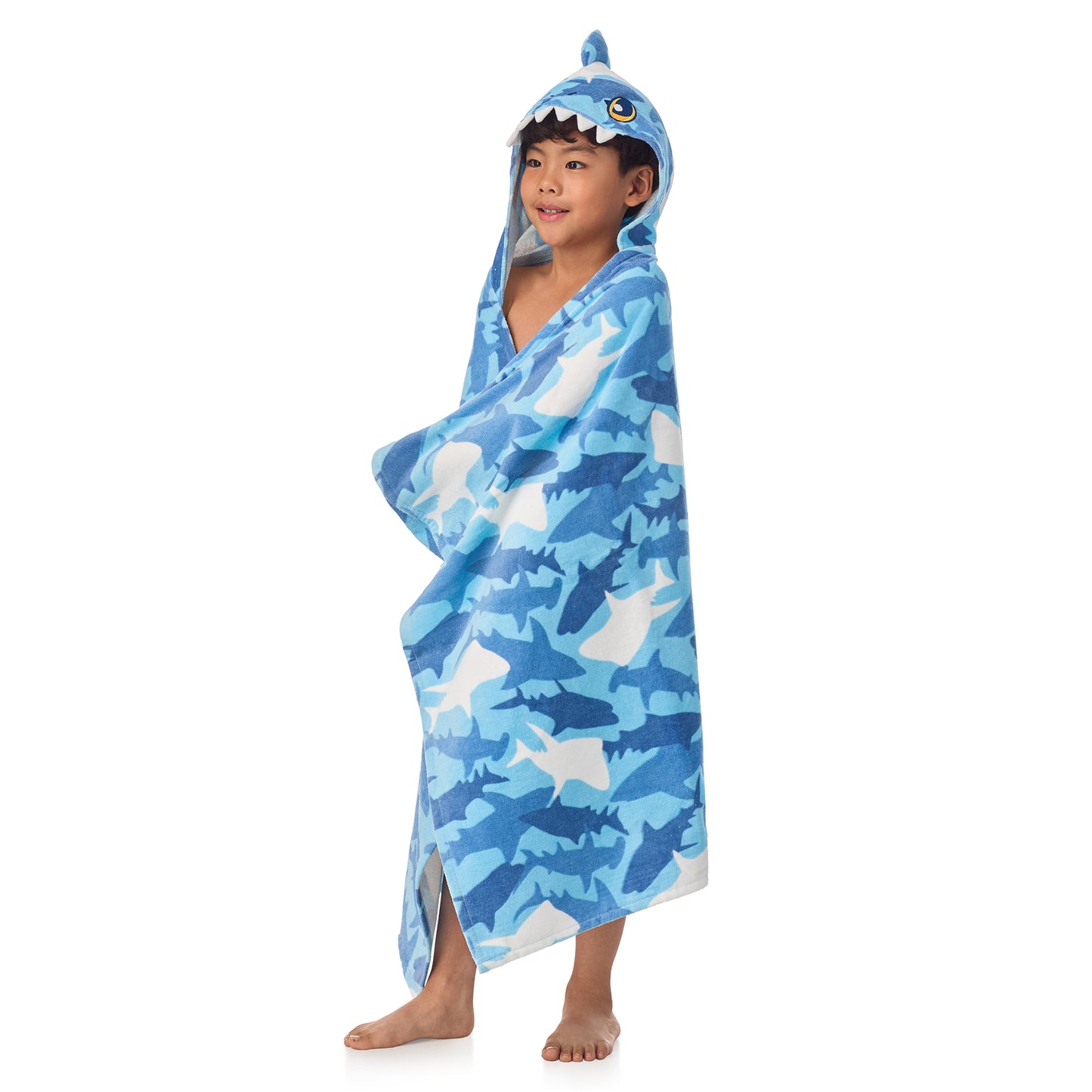 Fin Frenzy Blue;@A boy wearing Character Hooded Towels in Fin Frenzy Blue
