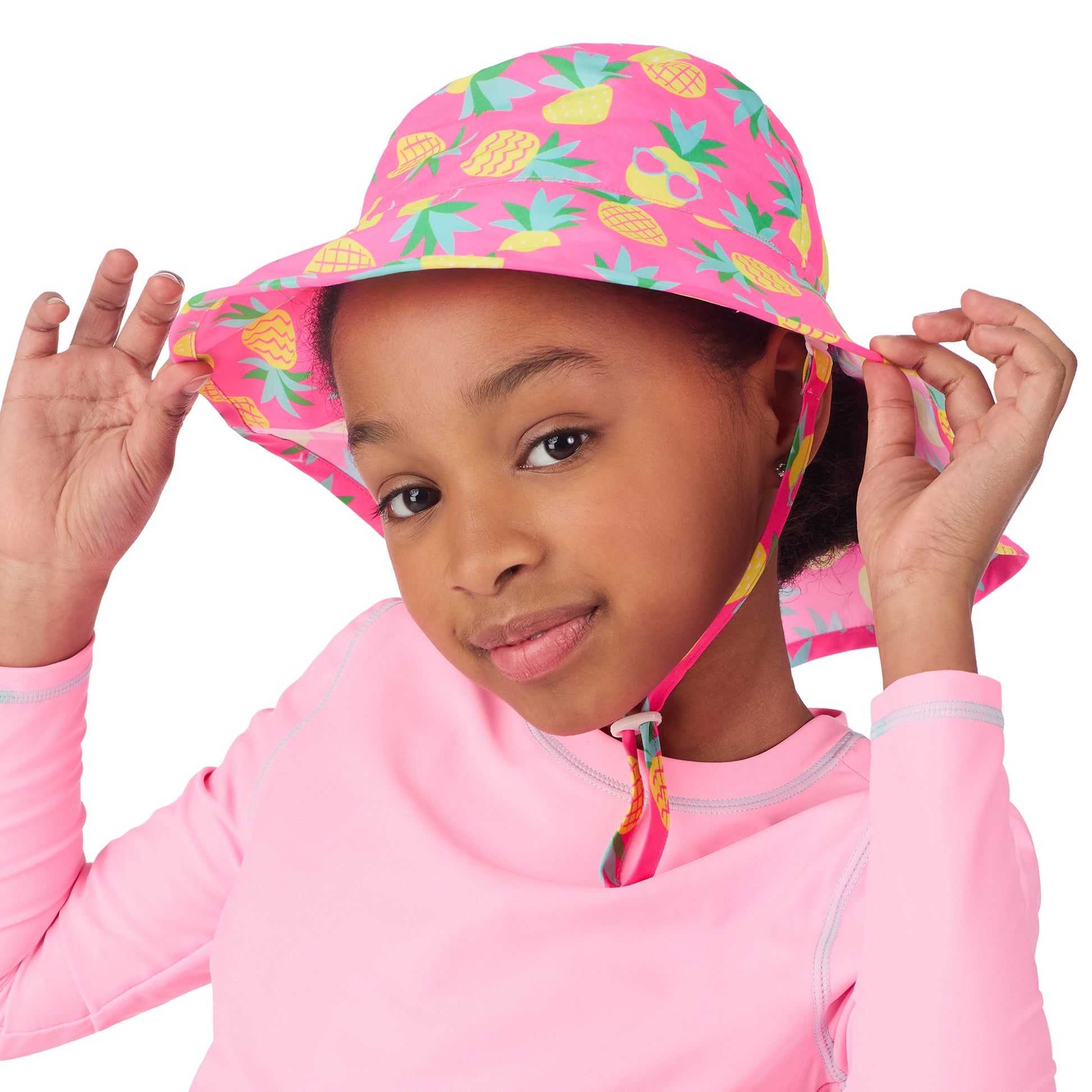 Pineapple Popstars Aqua;@A girl wearing UPF 50 Sun Hat in Pineapple Popstars Aqua
